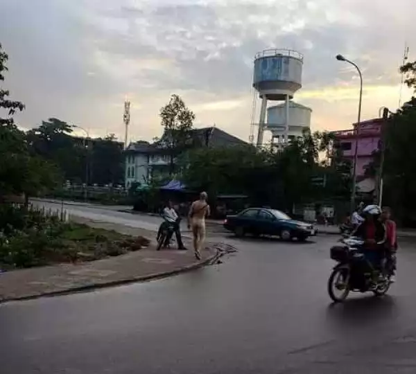 Photos: Naked man spotted walking down a street with no care in the world
